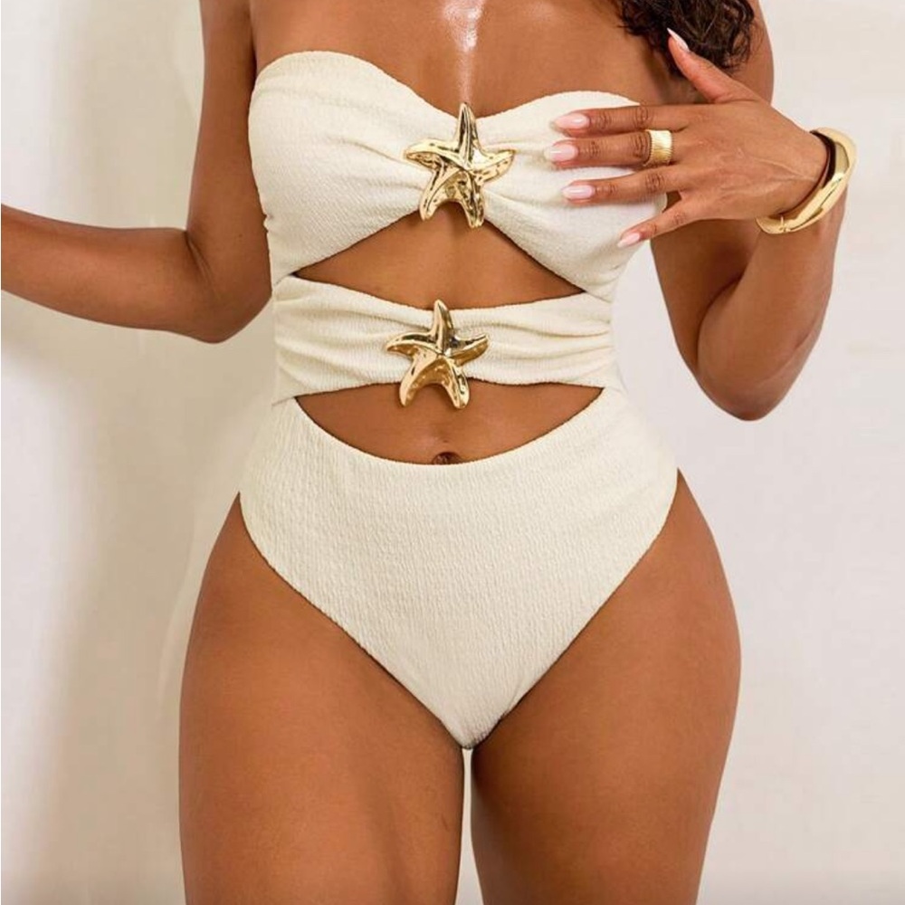 White Cutout Swimsuit with Gold Starfish Accents